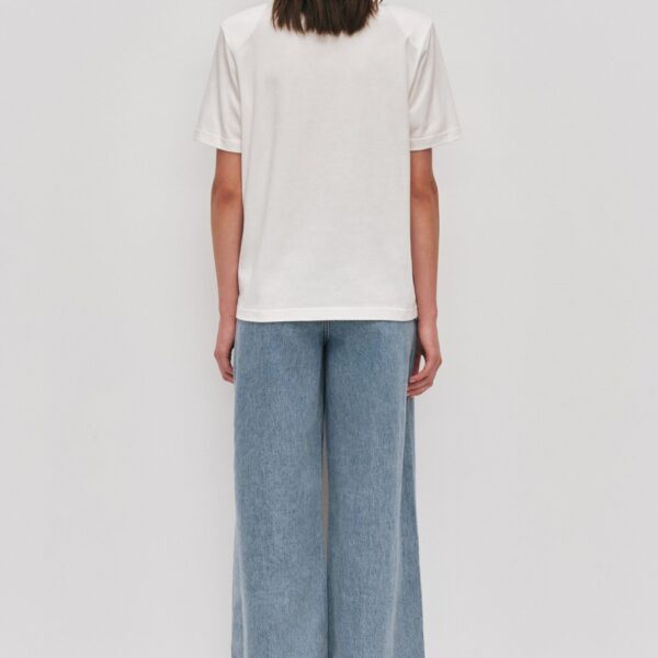 Aje Aus Tops – structured silhouette with raw femininity from Coveti