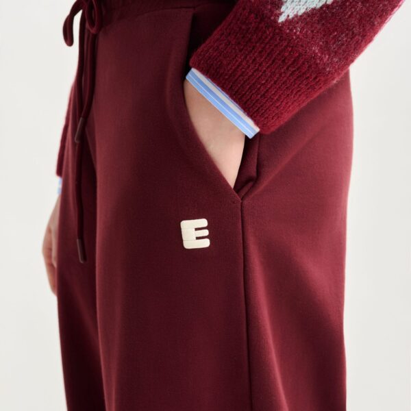 Essentiel Antwerp Burgundy cotton sweatpants with E-shaped embroidery - Essentiel Antwerp Pants - Colorful Belgian Design - Shop at Coveti