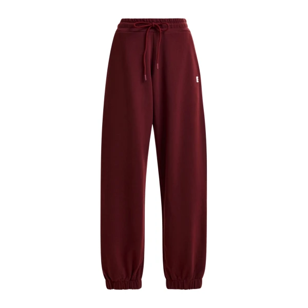 Essentiel Antwerp Burgundy cotton sweatpants with E-shaped embroidery - Essentiel Antwerp Pants - Colorful Belgian Design - Shop at Coveti