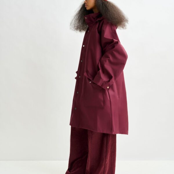 Essentiel Antwerp Burgundy hooded raincoat - Essentiel Antwerp Coats - Colorful Belgian Design - Shop at Coveti