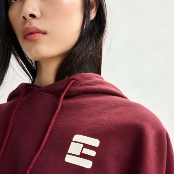Essentiel Antwerp Burgundy oversized cotton hoodie with "fearless"-print - Essentiel Antwerp Hoodies - Colorful Belgian Design - Shop at Coveti