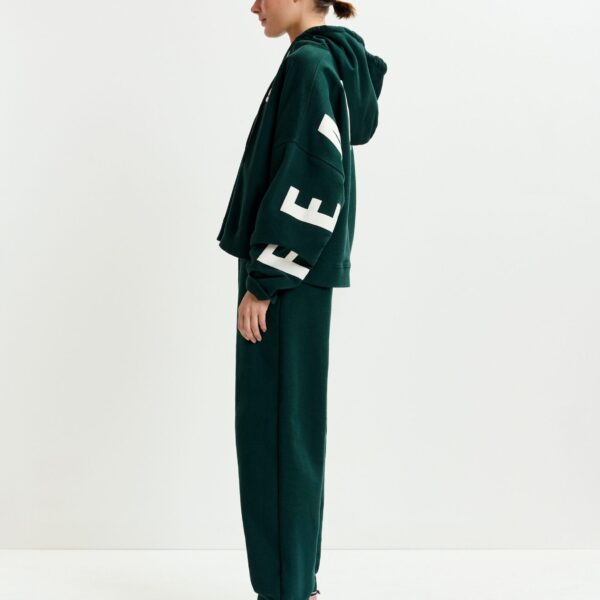 Essentiel Antwerp Dark green cotton sweatpants with E-shaped embroidery - Essentiel Antwerp Pants - Colorful Belgian Design - Shop at Coveti