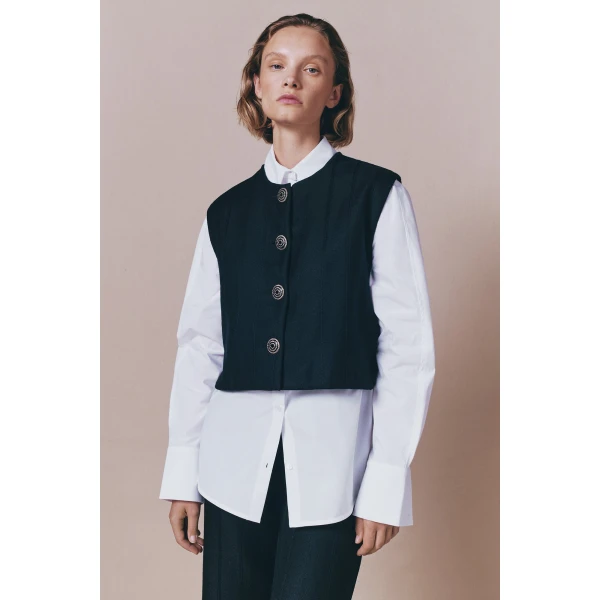 Destree Black buttoned virgin wool sleeveless vest - Destree - Graphic Parisian Fashion - Shop at Coveti
