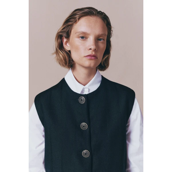Destree Black buttoned virgin wool sleeveless vest - Destree - Graphic Parisian Fashion - Shop at Coveti