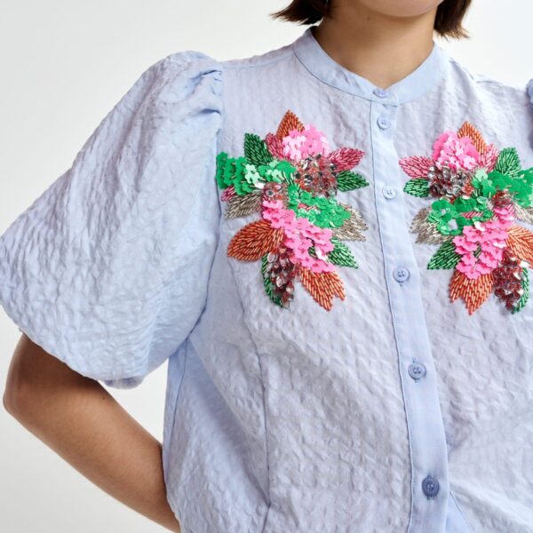 Essentiel Antwerp Light blue and multicolor floral sequin and bead-embellished shirt with voluminous sleeves - Essentiel Antwerp Shirts - Colorful Belgian Design - Shop at Coveti