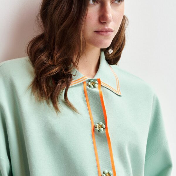 Essentiel Antwerp Light blue and orange knit cardigan with flower buttons and contrasting trims - Essentiel Antwerp Knitwear - Colorful Belgian Design - Shop at Coveti