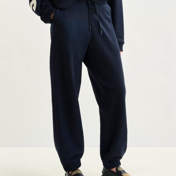 Essentiel Antwerp Navy cotton sweatpants with E-shaped embroidery - Essentiel Antwerp Pants - Colorful Belgian Design - Shop at Coveti