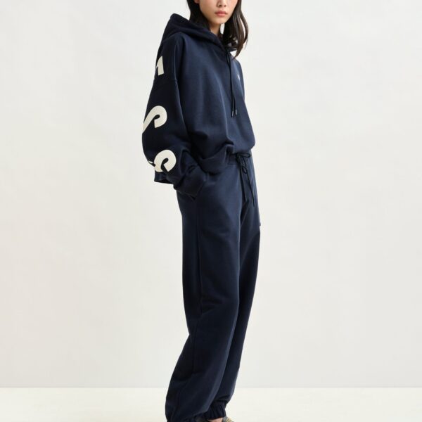 Essentiel Antwerp Navy cotton sweatpants with E-shaped embroidery - Essentiel Antwerp Pants - Colorful Belgian Design - Shop at Coveti