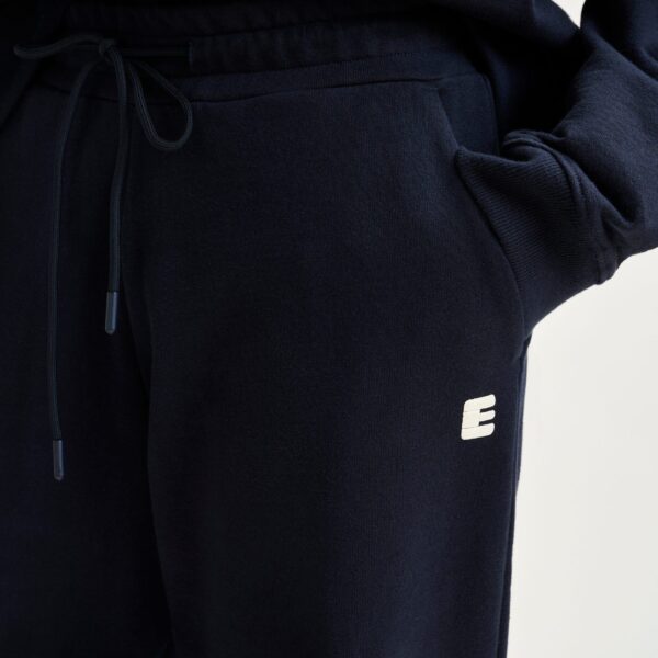 Essentiel Antwerp Navy cotton sweatpants with E-shaped embroidery - Essentiel Antwerp Pants - Colorful Belgian Design - Shop at Coveti