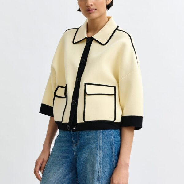 Essentiel Antwerp Off-white knit cardigan with flower buttons and black contrasting trims - Essentiel Antwerp Knitwear - Colorful Belgian Design - Shop at Coveti