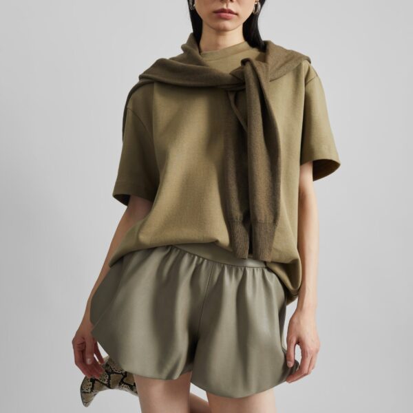 The Frankie Shop Alina Faux Leather Bubble Hem Shorts - Sage - Oversized Minimalist Shorts in Green - Shop at Coveti