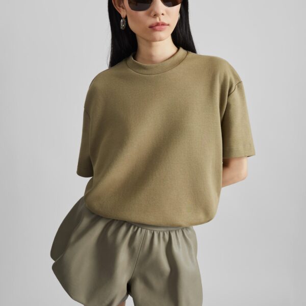 The Frankie Shop Alina Faux Leather Bubble Hem Shorts - Sage - Oversized Minimalist Shorts in Green - Shop at Coveti