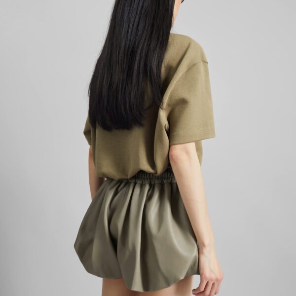 The Frankie Shop Alina Faux Leather Bubble Hem Shorts - Sage - Oversized Minimalist Shorts in Green - Shop at Coveti