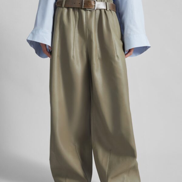 The Frankie Shop Oakdale Faux Leather Track Pants - Sage - Oversized Minimalist Pants in Green - Shop at Coveti