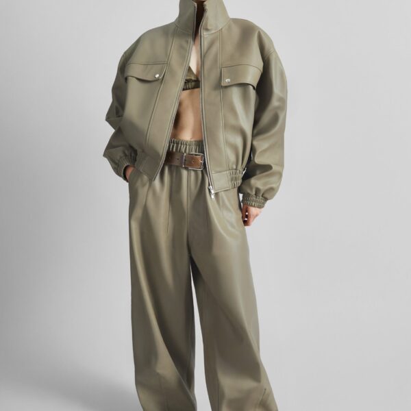 The Frankie Shop Oakdale Faux Leather Track Pants - Sage - Oversized Minimalist Pants in Green - Shop at Coveti