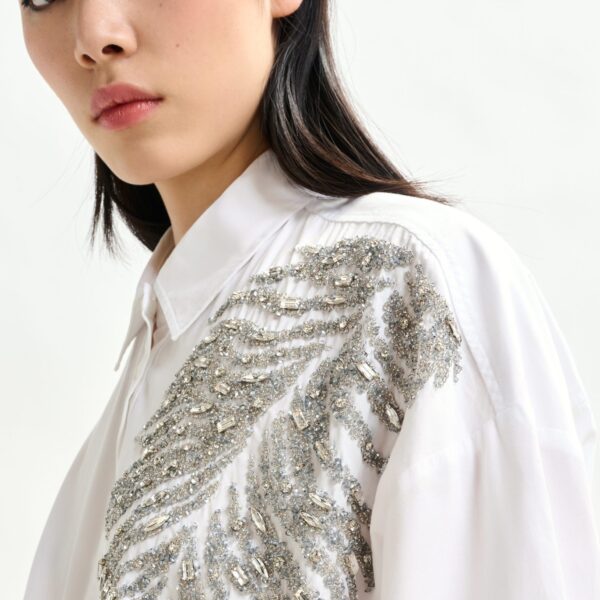 Essentiel Antwerp White and silver oversized cotton shirt with sequin and bead embellishment - Essentiel Antwerp Shirts - Colorful Belgian Design - Shop at Coveti