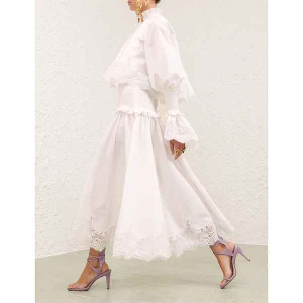 Elevate your elegance in this Zimmermann Dresses available now at Coveti
