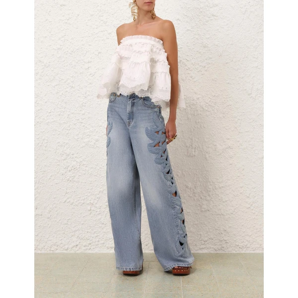 Elevate your elegance in this Zimmermann Tops available now at Coveti