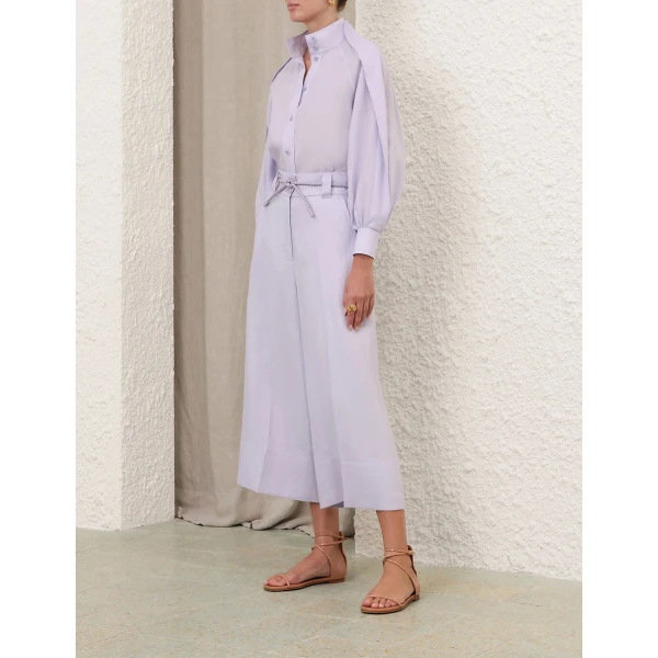 Elevate your elegance in this Zimmermann Tops available now at Coveti
