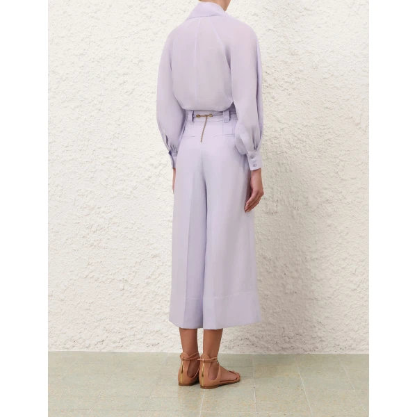 Elevate your elegance in this Zimmermann Tops available now at Coveti