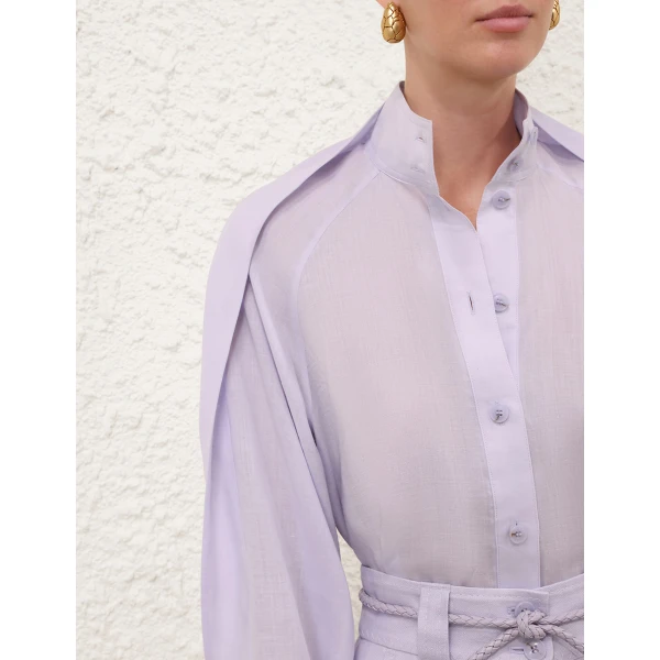 Elevate your elegance in this Zimmermann Tops available now at Coveti
