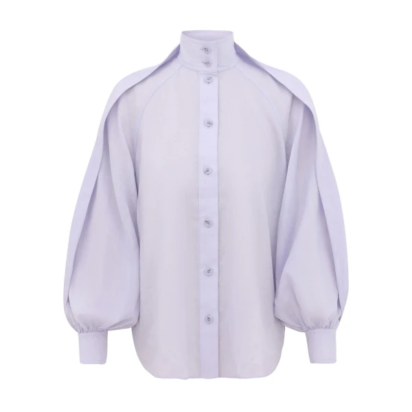 Elevate your elegance in this Zimmermann Tops available now at Coveti