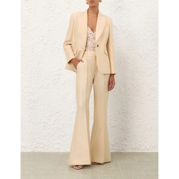 Elevate your elegance in this Zimmermann Bodysuit available now at Coveti