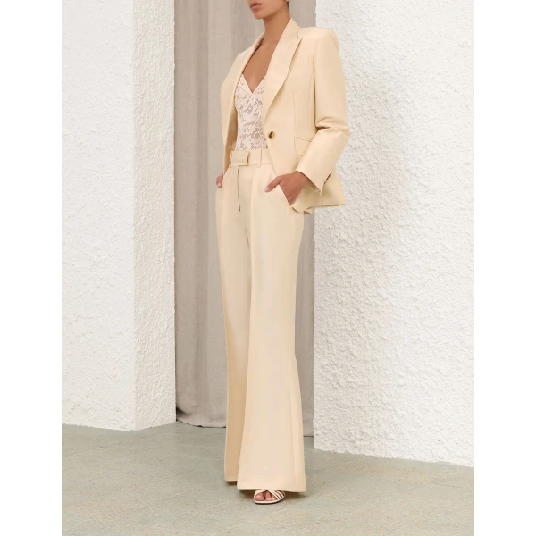 Elevate your elegance in this Zimmermann Bodysuit available now at Coveti