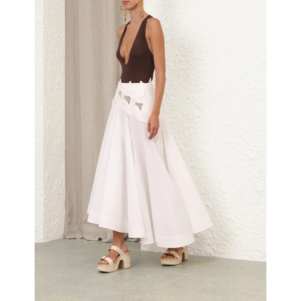 Elevate your elegance in this Zimmermann Skirts available now at Coveti