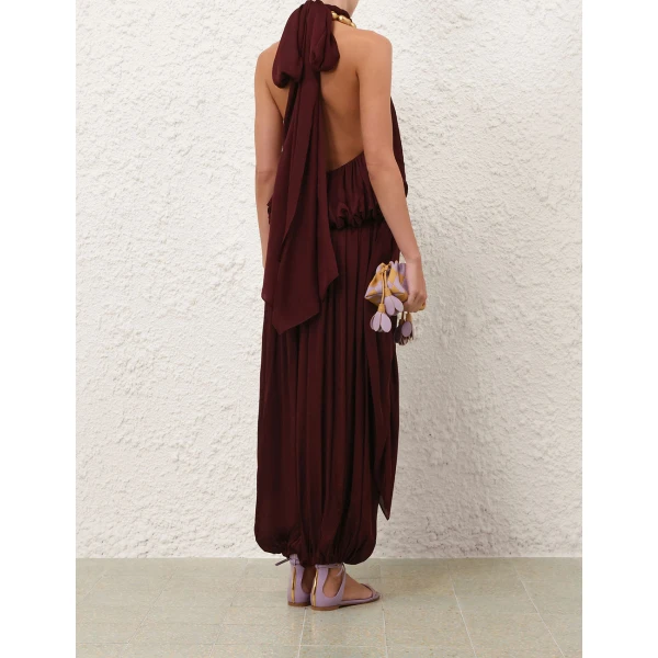 Elevate your elegance in this Zimmermann Tops available now at Coveti