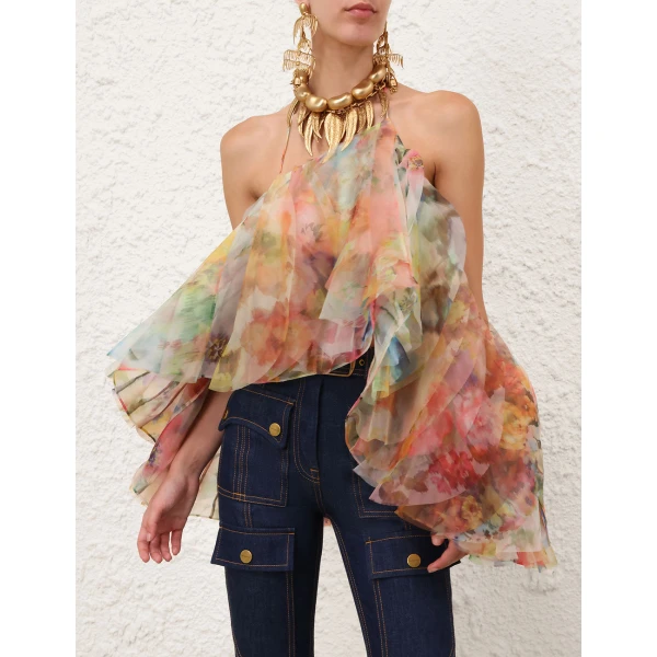 Elevate your elegance in this Zimmermann Tops available now at Coveti