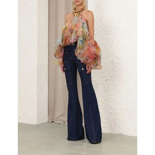 Elevate your elegance in this Zimmermann Tops available now at Coveti