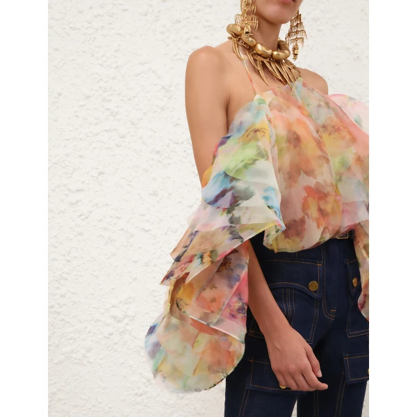 Elevate your elegance in this Zimmermann Tops available now at Coveti