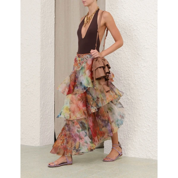 Elevate your elegance in this Zimmermann Bodysuit available now at Coveti