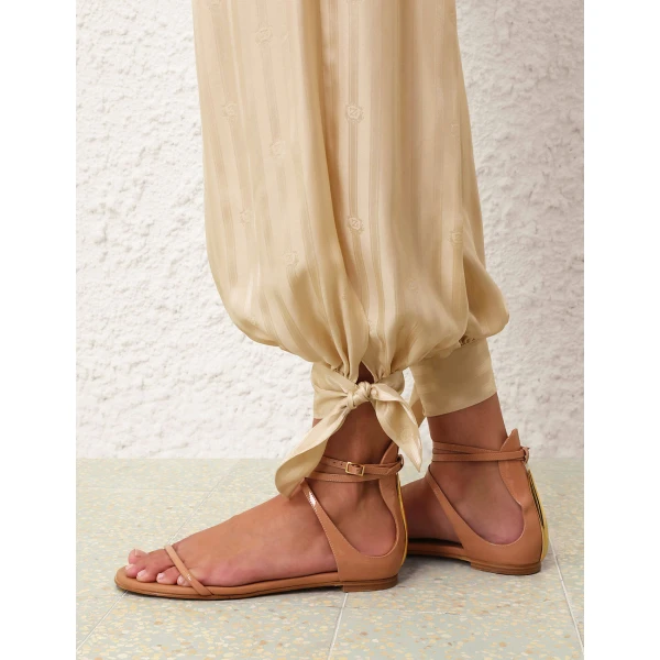 Elevate your elegance in this Zimmermann Pants available now at Coveti