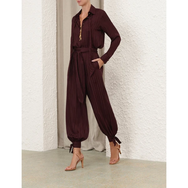 Elevate your elegance in this Zimmermann Tops available now at Coveti