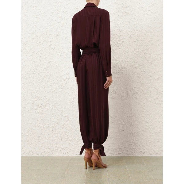 Elevate your elegance in this Zimmermann Tops available now at Coveti