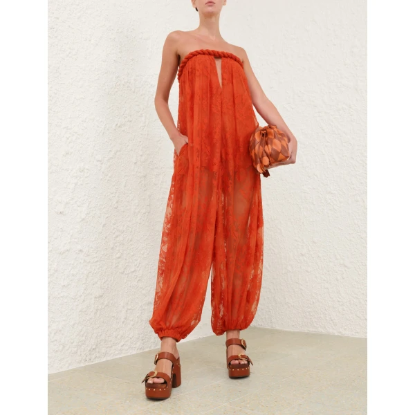 Elevate your elegance in this Zimmermann Jumpsuit available now at Coveti