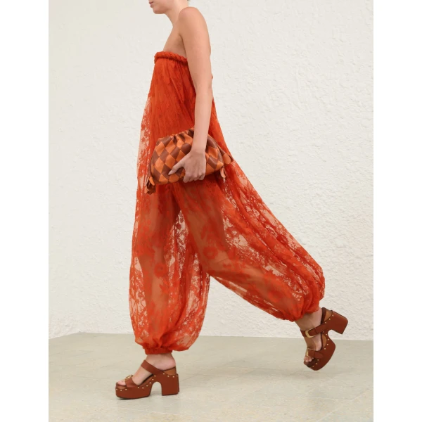 Elevate your elegance in this Zimmermann Jumpsuit available now at Coveti