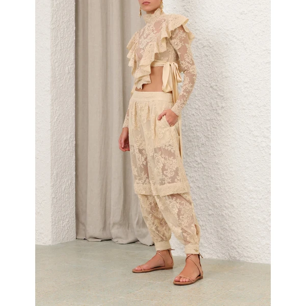 Elevate your elegance in this Zimmermann Tops available now at Coveti