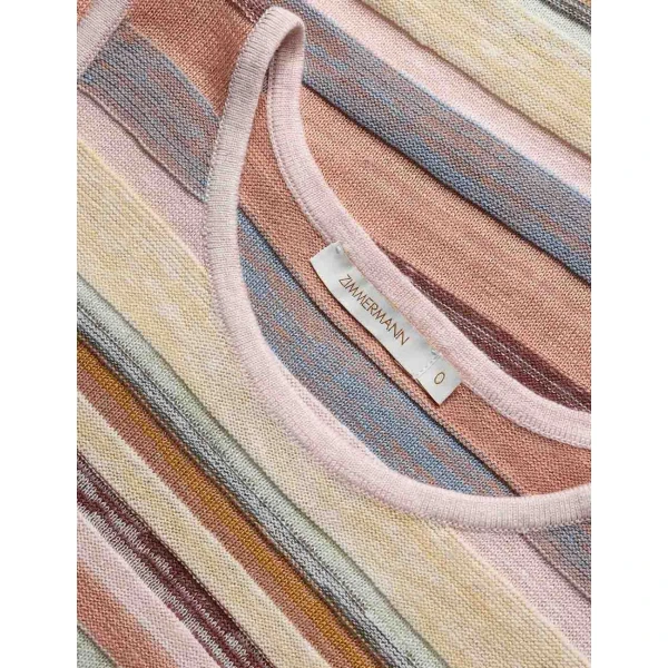 Elevate your elegance in this Zimmermann Tops available now at Coveti