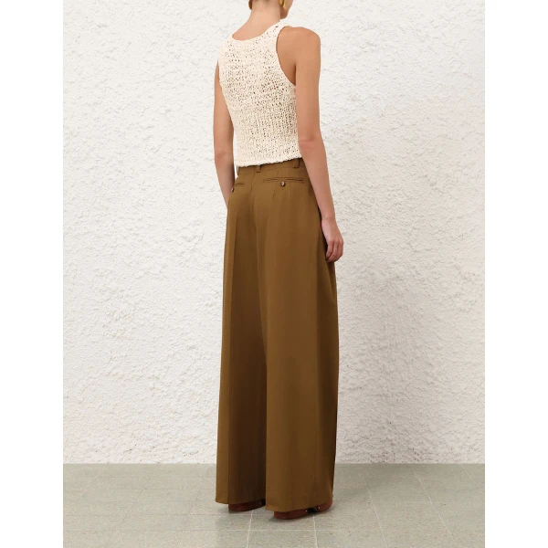 Elevate your elegance in this Zimmermann Tops available now at Coveti