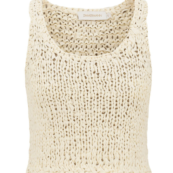 Elevate your elegance in this Zimmermann Tops available now at Coveti