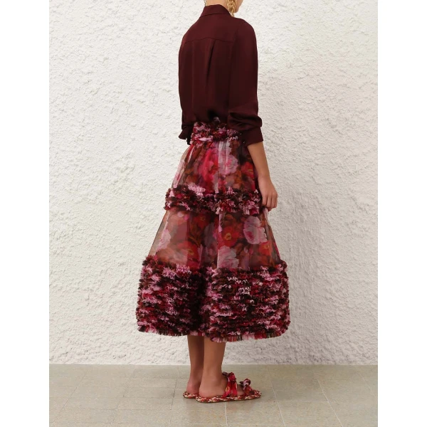 Elevate your elegance in this Zimmermann Tops available now at Coveti