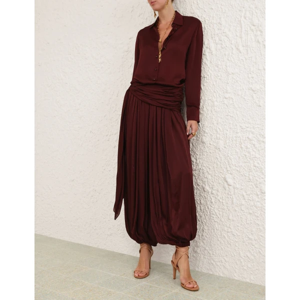 Elevate your elegance in this Zimmermann Tops available now at Coveti