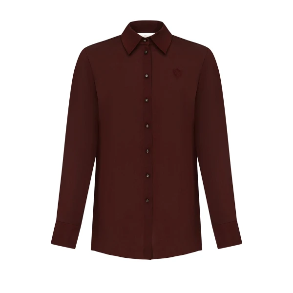 Elevate your elegance in this Zimmermann Tops available now at Coveti