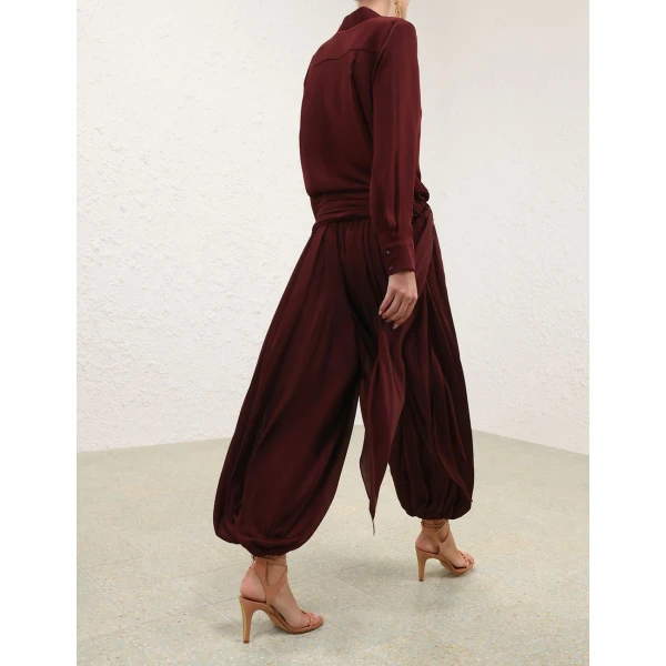 Elevate your elegance in this Zimmermann Tops available now at Coveti