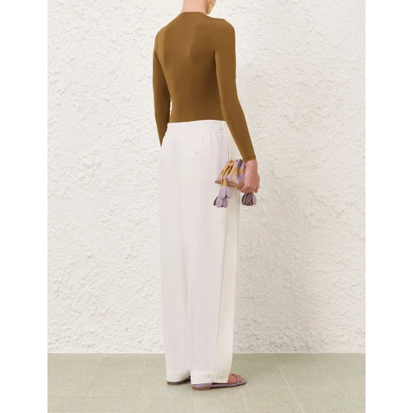Elevate your elegance in this Zimmermann Pants available now at Coveti