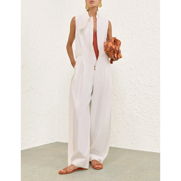 Elevate your elegance in this Zimmermann Jumpsuit available now at Coveti