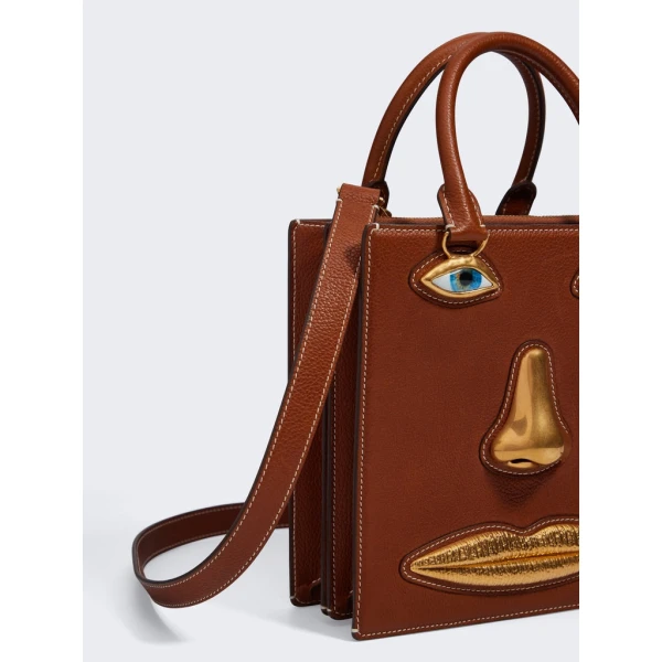 Schiaparelli nose bag